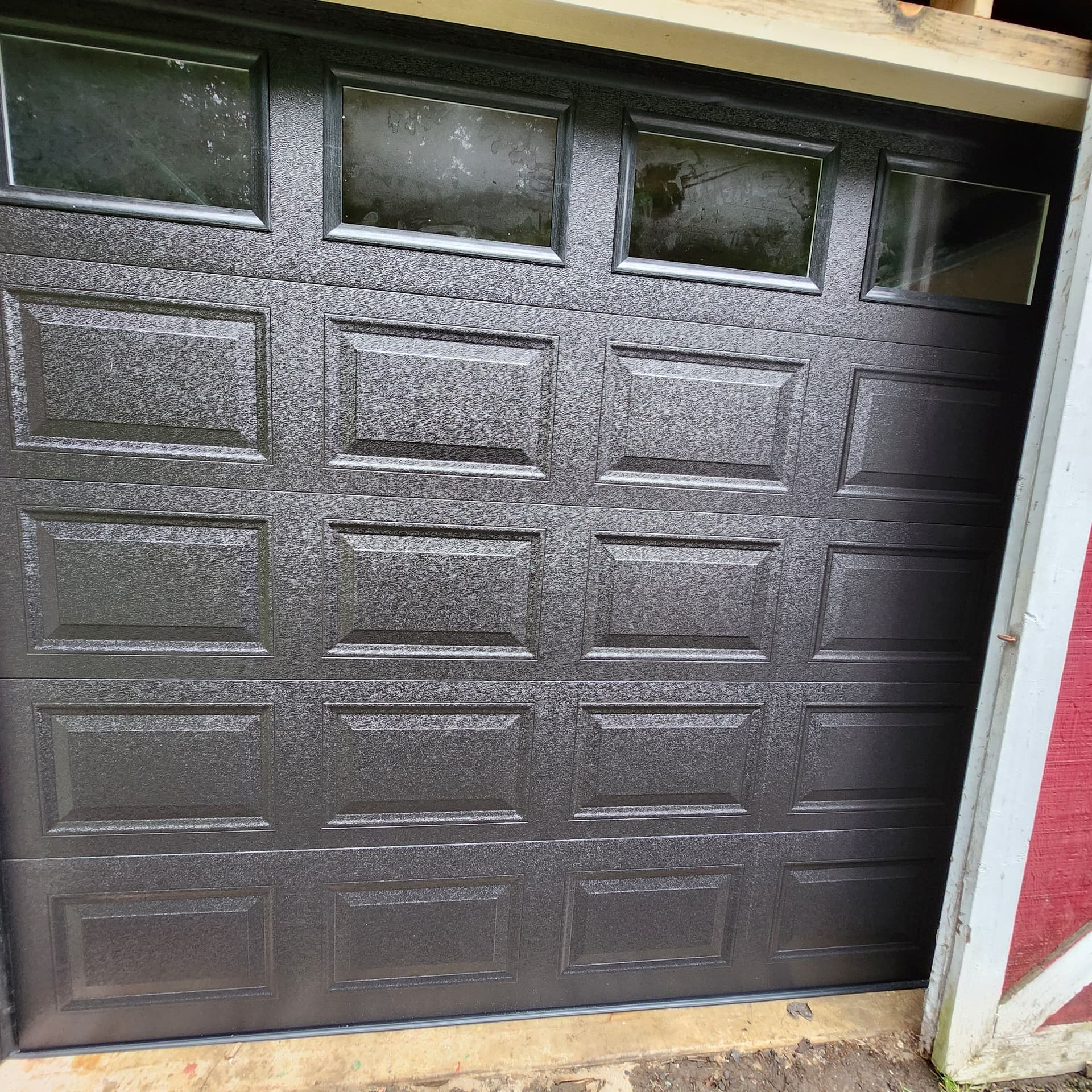 Stunning Black Garage Door Installation in Kingston image